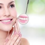 What is the difference between a simple and surgical tooth extraction?